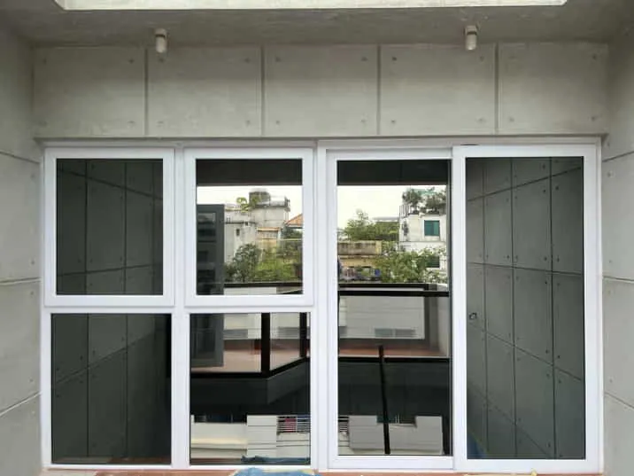 White multi-panel window with a smaller central opening panel