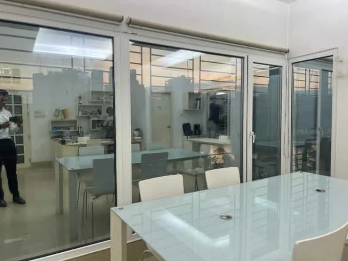 Glass interior partition around a bright working space